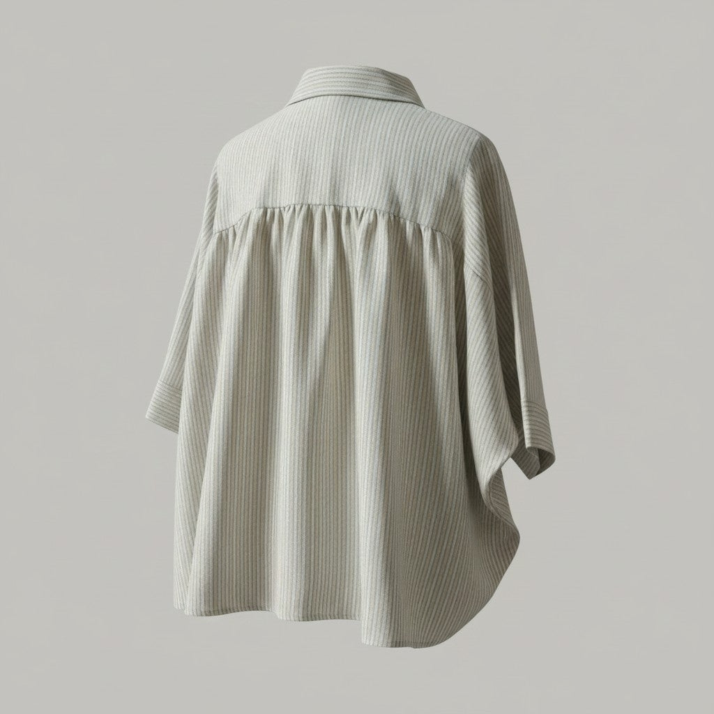 Vue arrière de la chemise oversize La Vie Continue beige à rayures dorées en viscose et polyester fluide