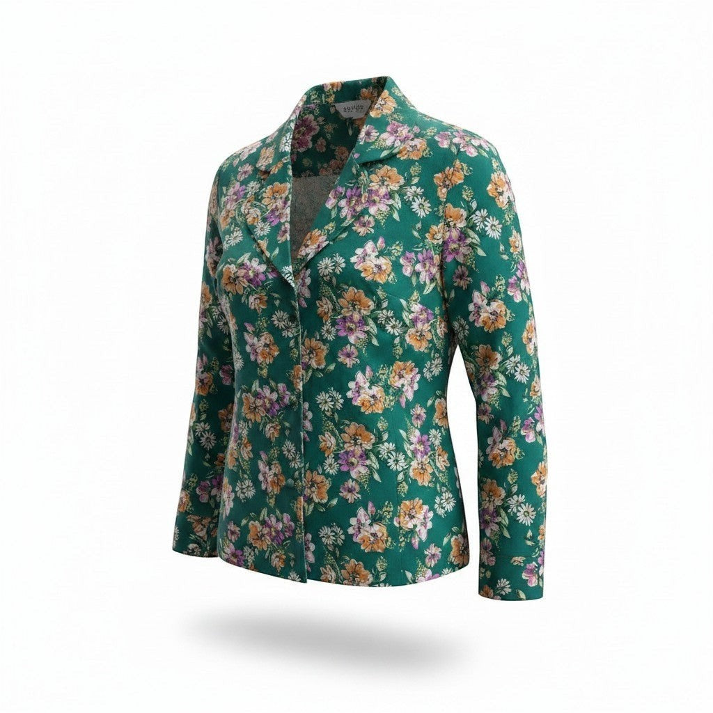 Veste blazer La Vie Continue verte à motifs floraux colorés, coupe structurée avec col tailleur élégant.