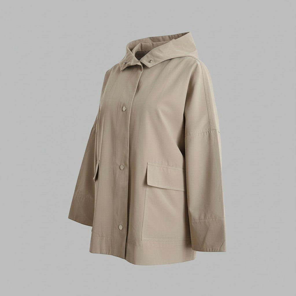 La Vie Continue beige hooded jacket made from a cotton, polyester, and polyamide blend. Features snap buttons, patch pockets, and a relaxed fit.