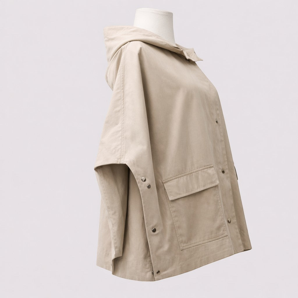La Vie Continue beige hooded jacket made from a cotton, polyester, and polyamide blend. Features snap buttons, flap pockets, and a modern, slightly loose fit.
