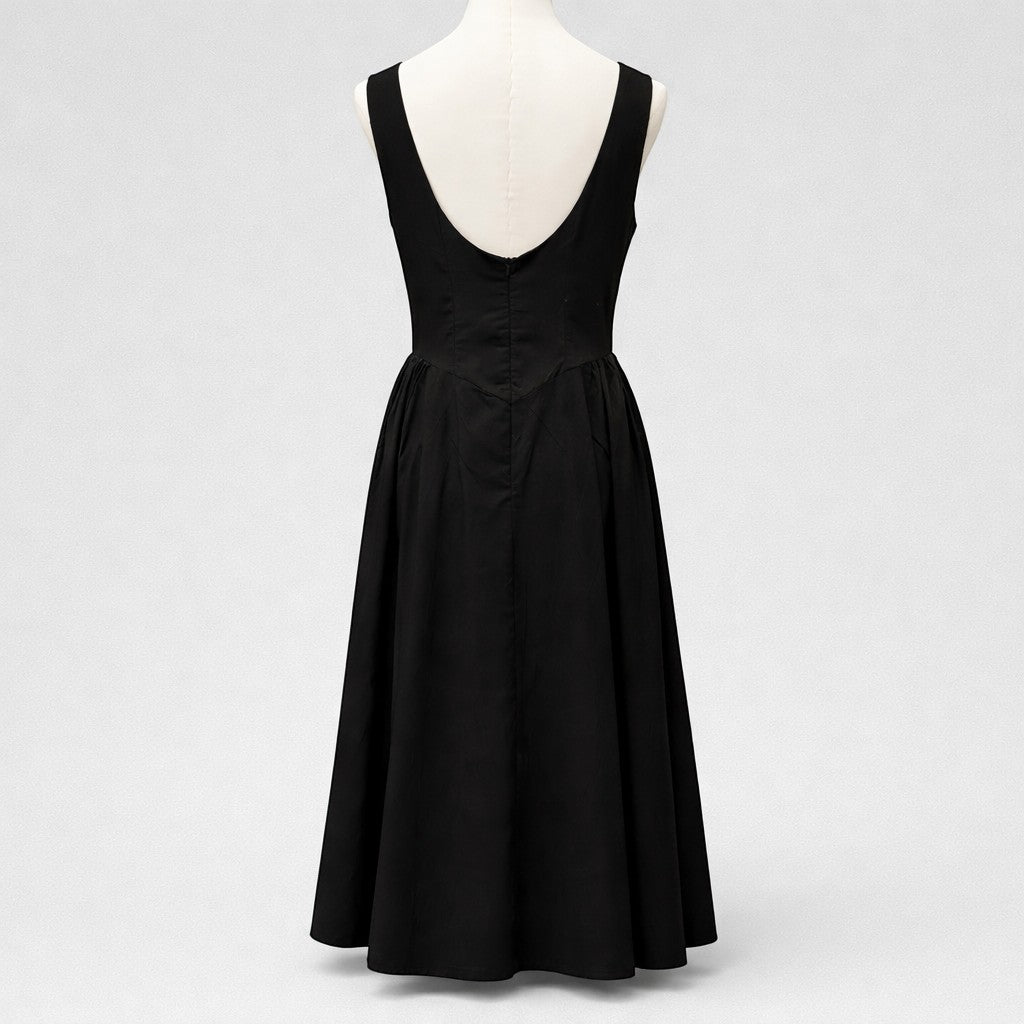 La Vie Continue black 100% cotton long dress with a deep V-back and flowing A-line skirt.