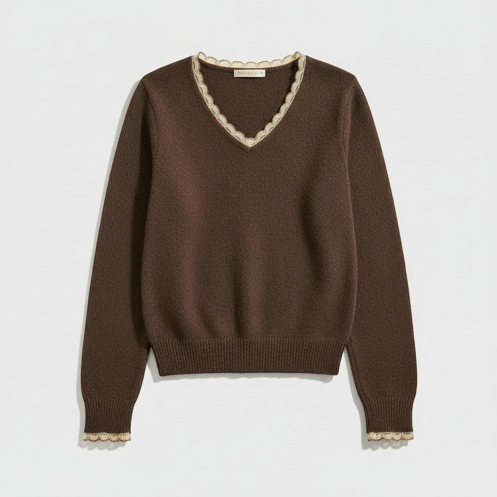 La Vie Continue brown wool V-neck sweater with crochet trim and decorative buttons on sleeves.