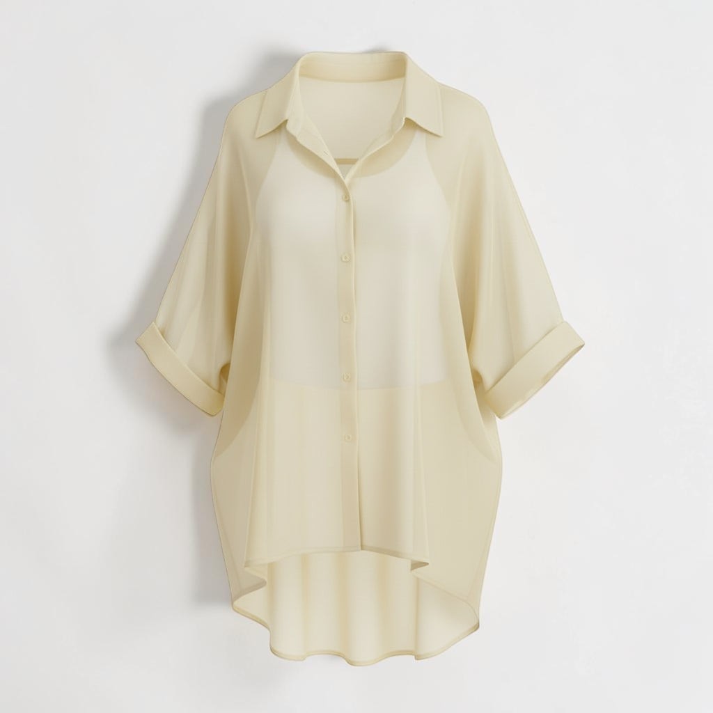 La Vie Continue cream oversized fluid shirt with rolled sleeves, made of 85% Lyocell and 15% Polyester.