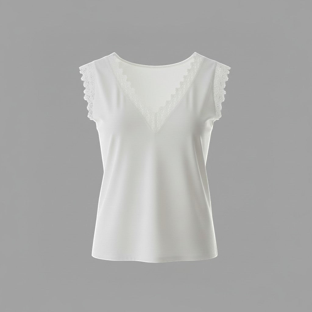 La Vie Continue white sleeveless V-neck top with delicate lace trim on neckline and armholes. Viscose and polyester blend.