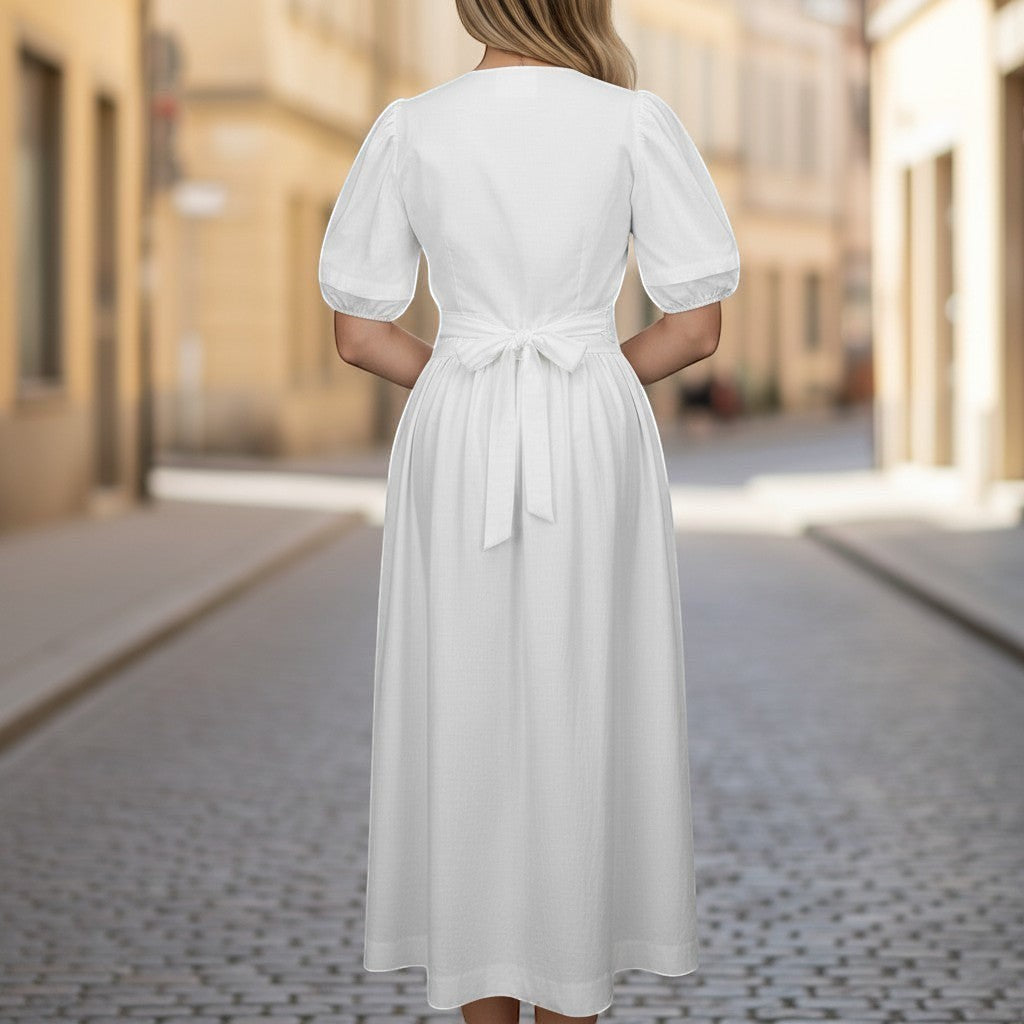 La Vie Continue white polyester midi dress with puff sleeves and a tie waist, perfect for summer.