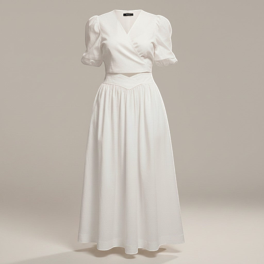 La Vie Continue white polyester wrap top and long flowing skirt set. Elegant summer outfit with puff sleeves and V-neck.
