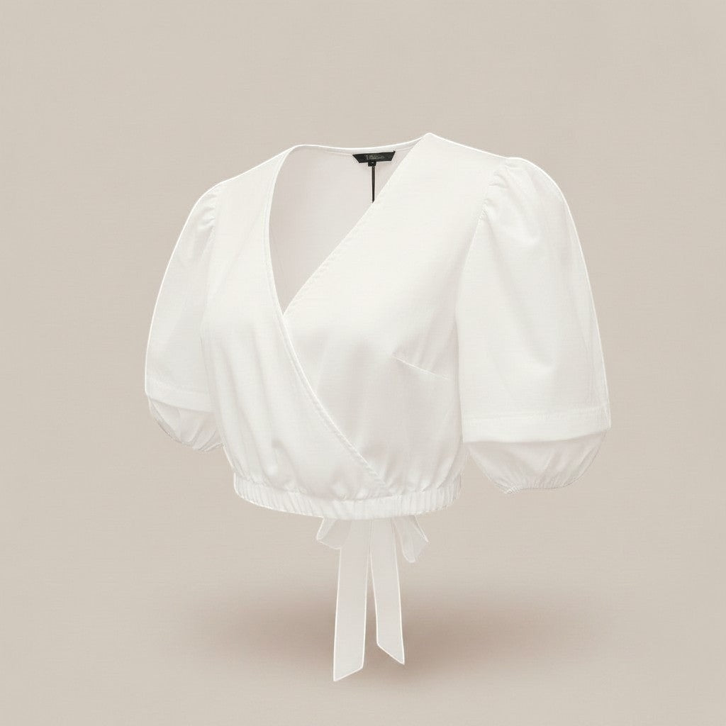 La Vie Continue white polyester wrap crop top with puff sleeves and tie waist, perfect for summer.